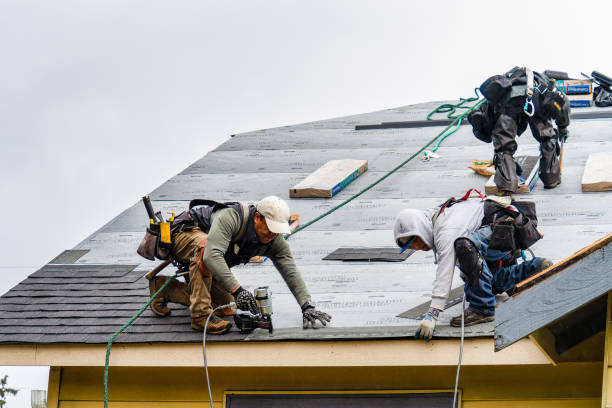 Professional Gutter Installation technician working in Woodbury, NY